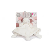 Beige rabbit baby comforter with soft ears on pink patterned background, ideal for newborns.